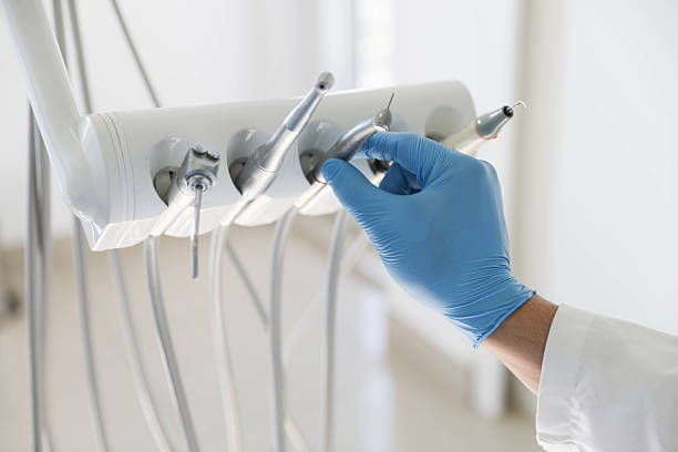 Professional Tooth Extraction technician working in Creswell, OR